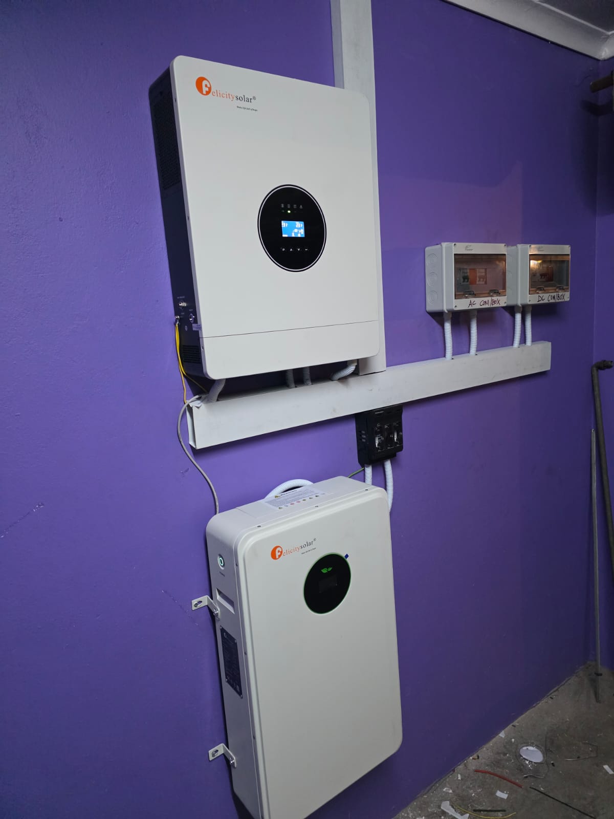 Inverter and isolators neatly installed on a wall